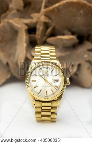 Rolex Oyster Perpetual Day- Date Watch On Desert Rose