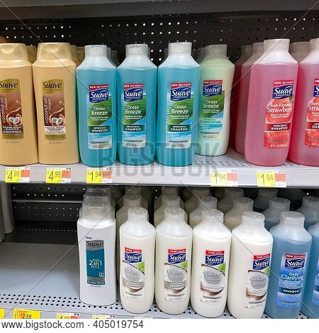Suave Brand Shampoo And Conditioner  Bottles On A Shelf At Walmart.