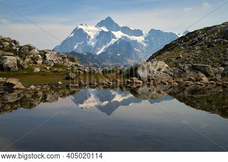Mt. Shuksan Reflection Washington State. Mt. Shuksan In The Washington State Cascade Mountain Range.
