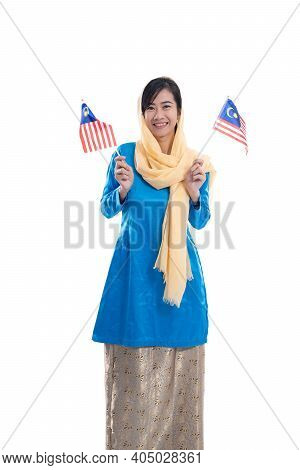 Muslim Woman Excited Holding Flag Of Malaysia