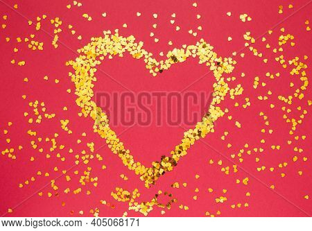 Gold Heart With Sparkles On Red Background. Valentines Day, International Womens Day