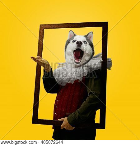 Framing. Model Like Medieval Royalty Person In Vintage Clothing Headed By Dog Head On Bright Yellow 
