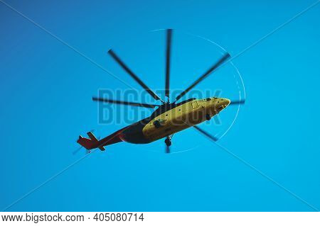 The World's Largest Cargo Helicopter Hovers Overhead. Bottom View