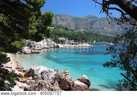 Mlini, Croatia - June 27, 2019: Tourists Enjoy Summer Vacation In Mlini Near Dubrovnik. Croatia Had 