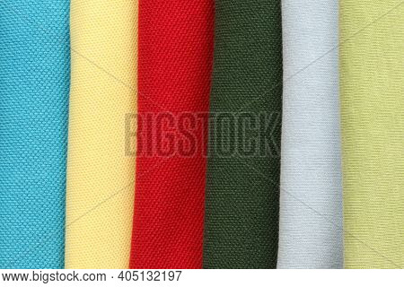 The Texture Of The Fabric Of Different Colors For Clothing.