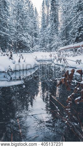Green Wellspring, The Source Of Natural Mineral Water In The Forest Of Mari El, Russia, Winter Natur