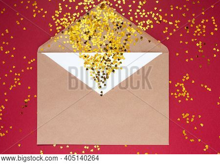 Envelope With White Sheet Of Paper For Message To Loved One With Tittle Sparkles On Red Background W