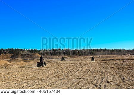 View Of Quaders On A Sandy Open Area