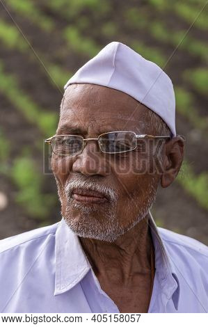 Abbigeri, Karnataka, India - November 6, 2013: Facial Closeup Of Siddappa Gidigena, Peanut Farmer Is