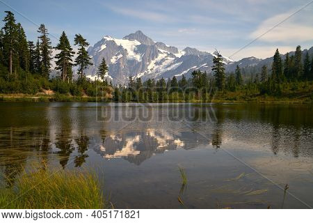 Picture Lake Mt. Baker Usa. Mt. Shuksan In The Washington State Cascade Mountain Range Reflected In 
