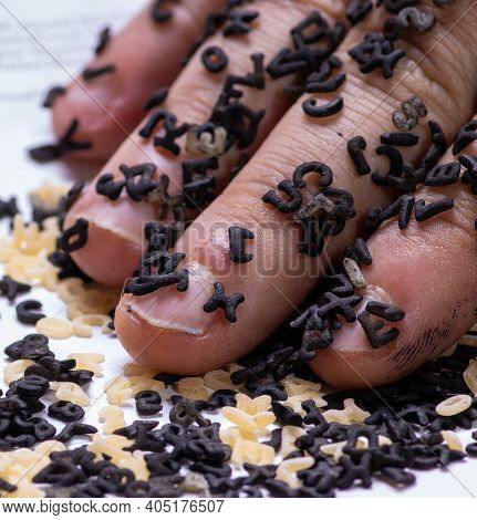 Photo Of A Hand More Black Lettered With White Background