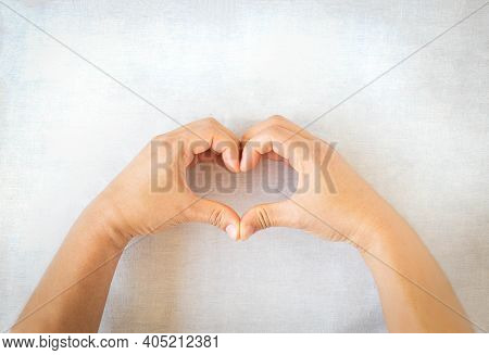 Hands Gesture Heart Shape On White Isolated Background With Copy Space. Concept For Love, Help, Kind