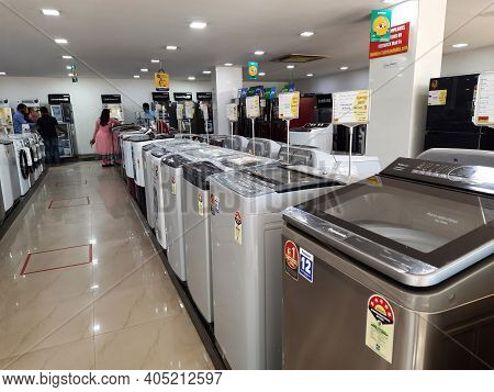 Closeup Of New Washing Machine, Mobile, Steamed Iron Box In A Girias Electronics Showroom At Gokul E