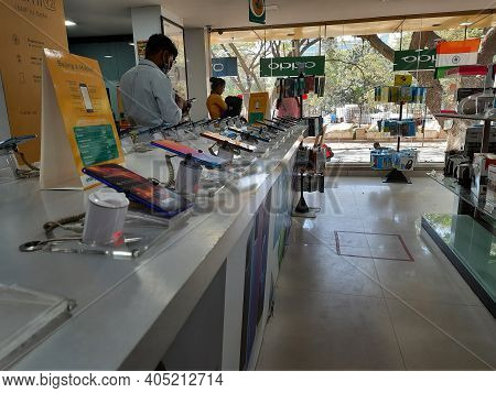 Closeup Of New Washing Machine, Mobile, Steamed Iron Box In A Girias Electronics Showroom At Gokul E