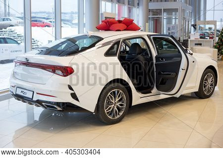 Russia, Izhevsk - December 28, 2020: Kia Showroom. New Modern K5 Business Class Car With Opened Pass
