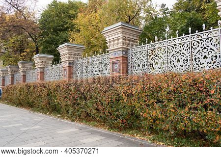 Walkway With Trimmed Bushes And A Beautiful Fence, Moscow, Background