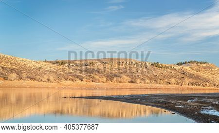 fall or winter scenery of mountain lake at foothills of Rocky Mountains in afternoon light, Horsetooth Reservoir - a popular recreational area in northern Colorado