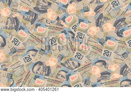 20 Mexican Pesos Bills Lies In Big Pile. Rich Life Conceptual Background. Big Amount Of Money