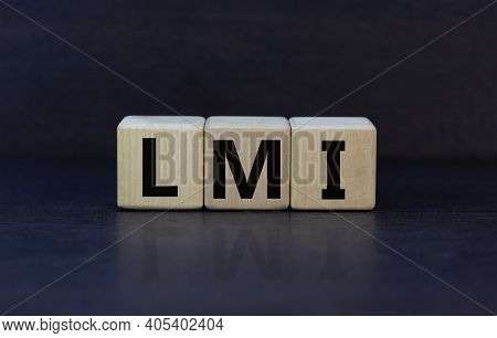 Lmi, Lenders Mortgage Insurance Symbol. Wooden Cubes Form The Word 'lmi, Lenders Mortgage Insurance'