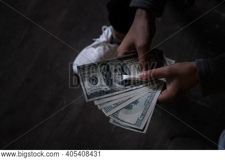 Close-up Of The Drug-dealing Halone On A Black Wood Background