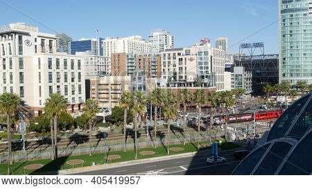 San Diego, California Usa - 13 Feb 2020: Mts Red Trolley And Metropolis Urban Skyline, Highrise Skys