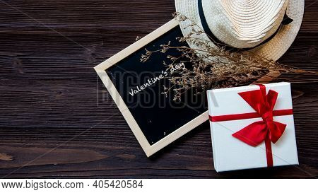Gift And Present For Valentine Day.  Red Present For Spacial Day With Love On Wood Background. Copy 