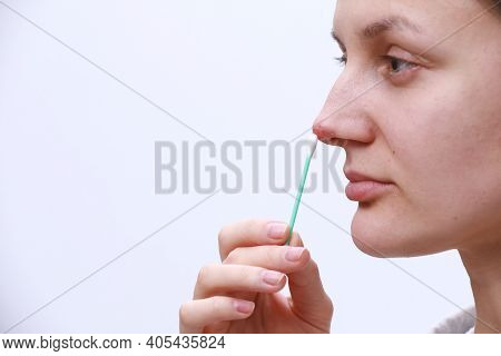Herpes On The Nose - Pretty Young Woman Woman Holding An Ear Stick With Herpes Medicine. Human Virus