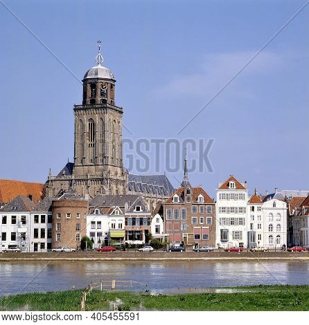The Grote Or Lebuinues Church, Seen From The Other Site Of The River Ijssel In Deventer, Holland