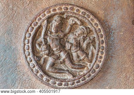 Aihole, Karnataka, India - November 7, 2013: Durga Gudi Or Temple. Closeup Of Brown Stone, 2 Human F