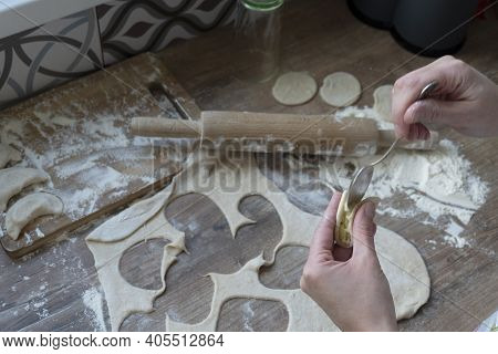 Process Of Filling Mashed Potato At A Round Rolled Piece, Woman Hands With Tea Spoon, Rolled Dough, 