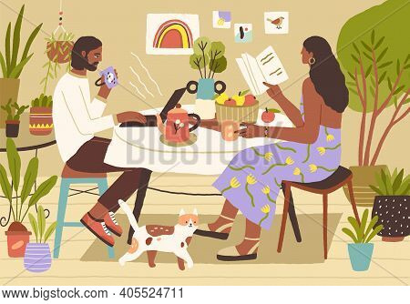 Young Couple Enjoying Spending Leisure Time At Home. Man Surfing At The Internet Or Working With Lap
