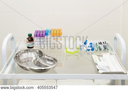 Blood Tubes In Tray In Medical Lab. Empty Blood Tube Tests Ready For Analysis In The Laboratory Of H