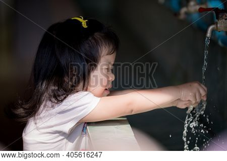 Asian Little Kid Girl Is Trying To Wash Her Hands To Keep Her Hands Clean And Without Germs For Good