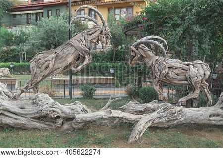 Attraction, Sculpture Made Of Wood Two Goats With Horns In Port Of Old City And In Kaleici Park Kara