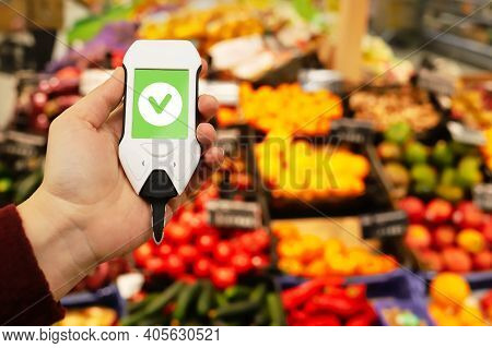 Use Nitrate Tester In Market To Buy Organic Vegetables And Fruits. Inspection Of Farm Products To Hi
