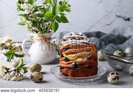 Easter Cake Craffin And Quail Eggs On A Gray Background. Concept Of The Spring Church Holiday