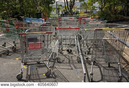 Mackay, Queensland, Australia - January 2021: Old Shopping Trolleys Lined Up Outside The Local Tip S