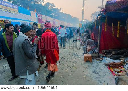 Kolkata, West Bengal, India - 12th January 2020 : Hindu Sadhu In Safron Dress Walking In Gangasagar 