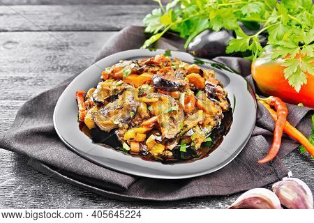 Ragout With Eggplant And Pepper On Dark Board