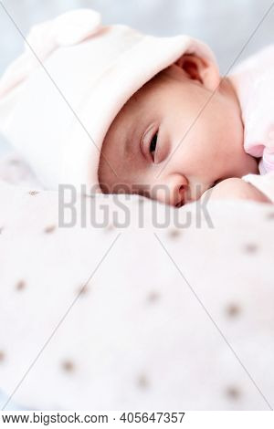 Childhood, Care, Motherhood, Health Concepts - Close Up Little Peace Calm Newborn Baby Girl In Pink 