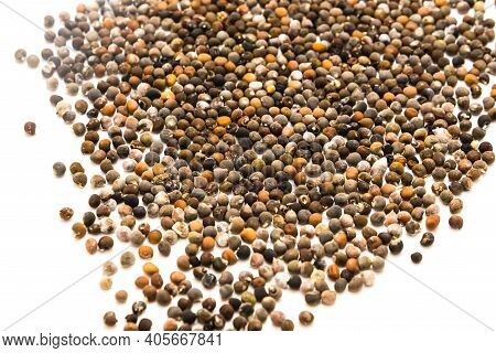 Many Okra Or Lady Fingers, Abelmoschus Esculentus Seeds Spreading Isolated On White Background
