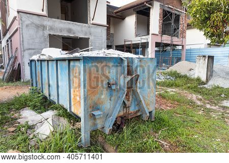 Garbage Roro Dumpter Bin Collects Rubbish At Construction Site