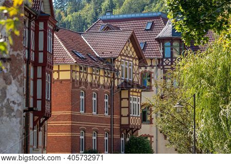 Facades Of Historic Half-timbered Houses Surrounded With Trees In Meiningen, Thuringia