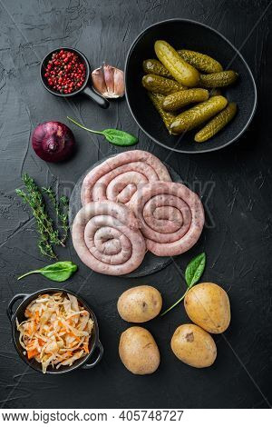 Fried Bavarian German Nürnberger Sausages With Sauerkraut, Mashed Potatoe, On Black Background, Top 