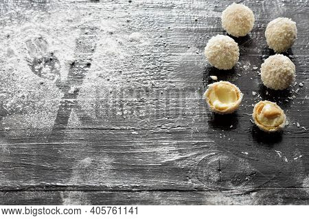 Homemade Candy White Chocolate And Coconut On A Plate On The Table. Candy -truffles Snowball/ White 