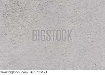 Stucco Wall Texture. White Concrete Surface Background. Gray Plaster Wall Pattern. Distressed Backdr