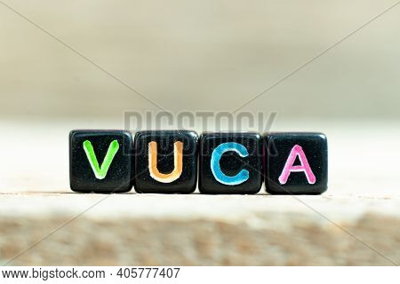 Black Color Block With Word Vuca (abbreviation Of Volatility, Uncertainty, Complexity And Ambiguity)