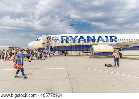 Vienna, Austria - May 09, 2019: Passengers Boarding Ryanair Flight From Santiago Spain To Milano Ita