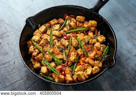 Vegetarian Meat Free Mycoprotein Pieces Vegetable Stir Fry Served In Cast Iron Skillet Frying Pan