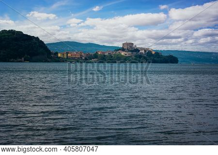 View Of The Picturesque Village Of Capodimonte On The Coast Of Lake Bolsena